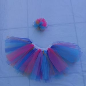 Tutu skirt with hair band. Size 2-3 years old. Color, pink,blue, gold and purple